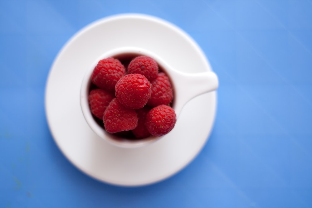 cranberries on teacup and saucer