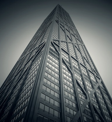 worm's eye-view photography of gray high-rise building