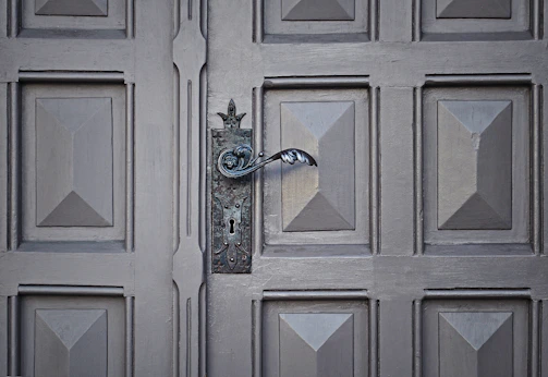 Close-up of intricate architectural details on a restored vintage doorway.