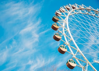 white Ferris wheel under clear sky during daytime