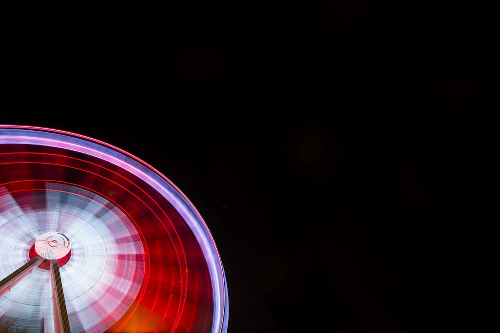 time lapse photography of ferris wheel during nighttime