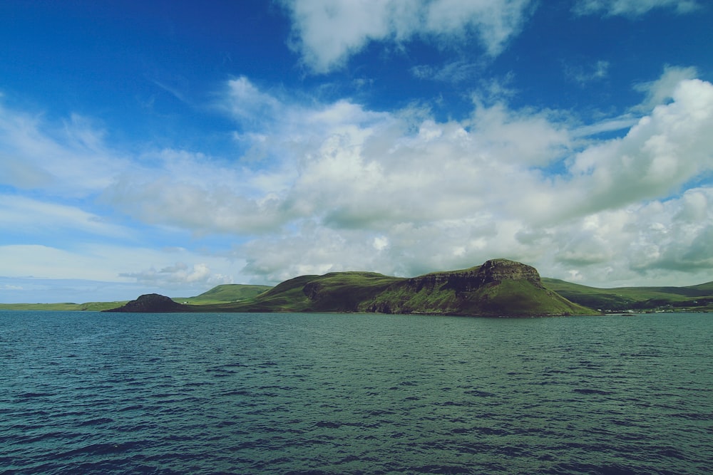 island under blue sky