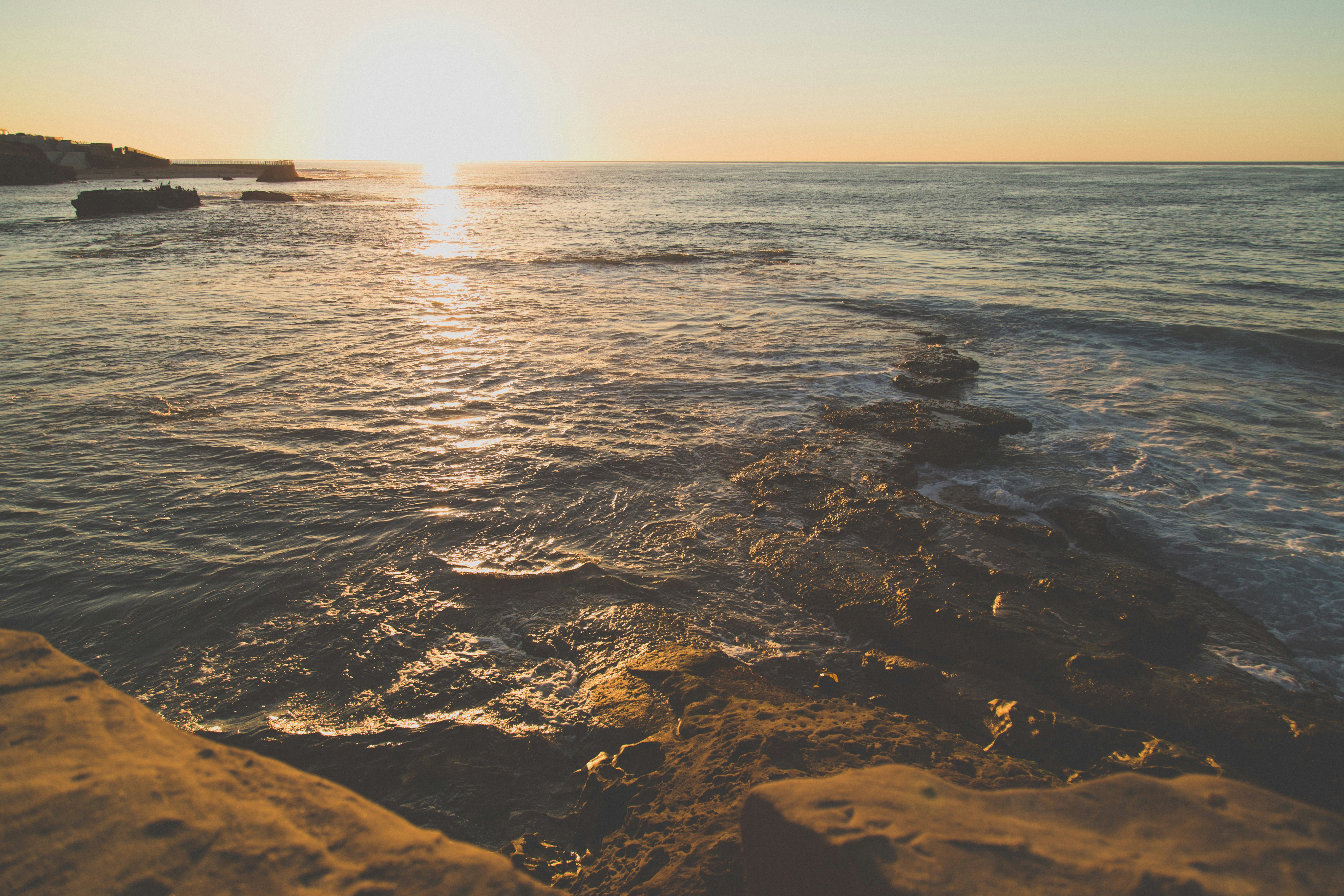 summer view of the sunbathed  San Diego ocean with steady clouds at sunset
