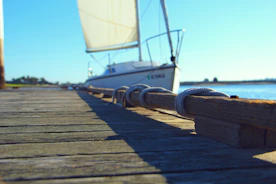 Close-up of a traditional wooden boat docked by the shore