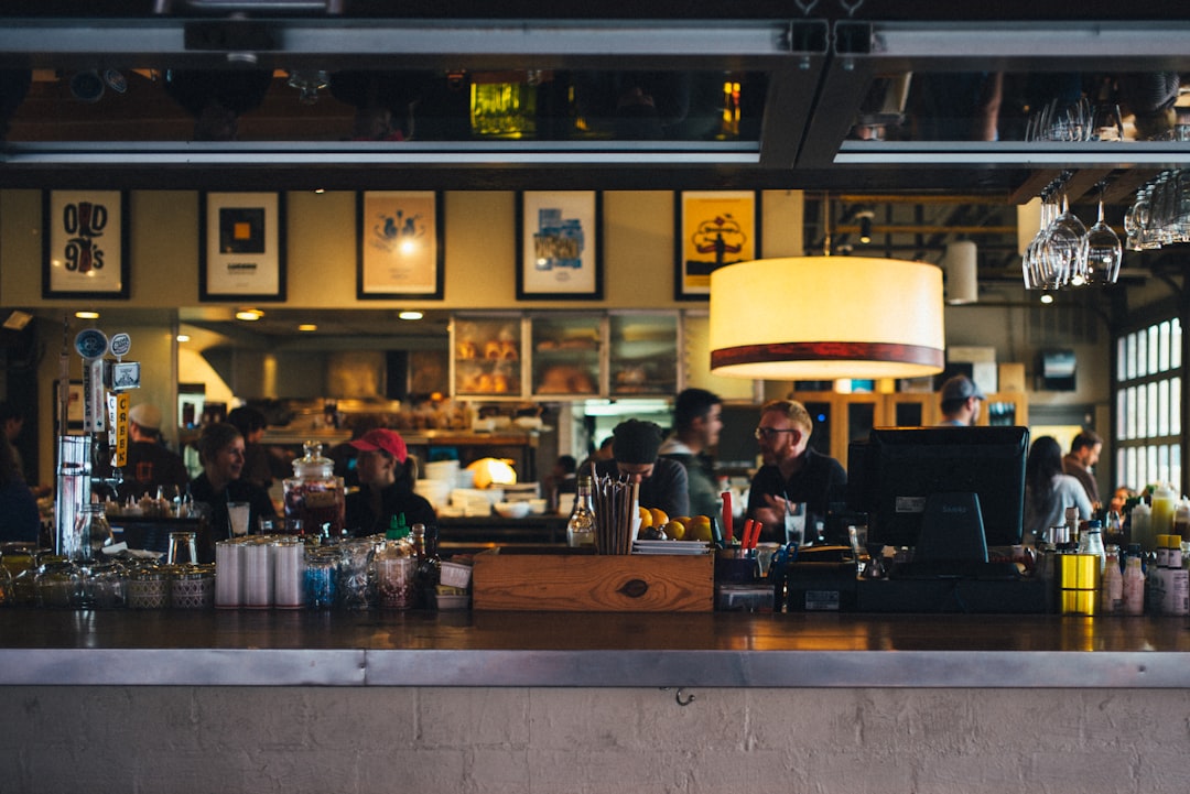 people sitting inside cafe, cafe bar counter