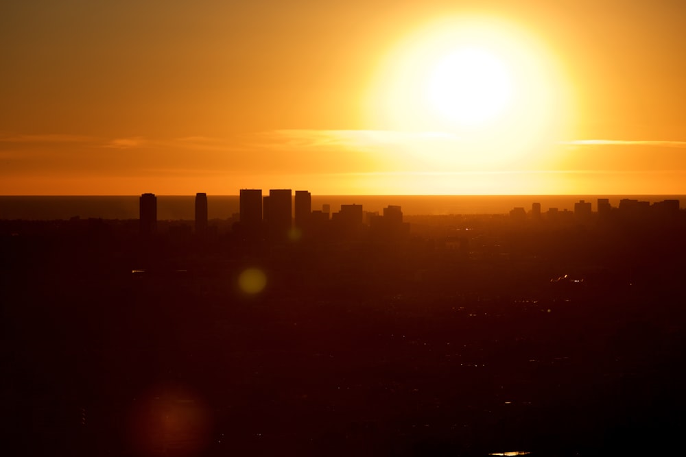 silhouette of high-rise buildings during golden hour