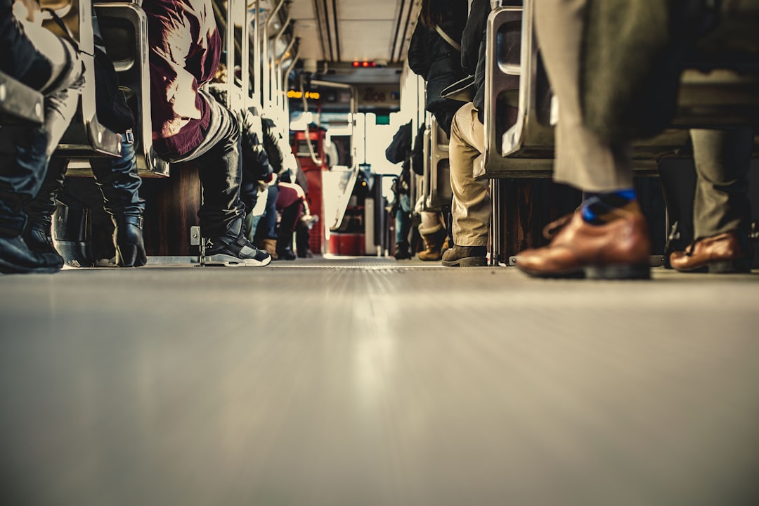 people sitting inside bus,