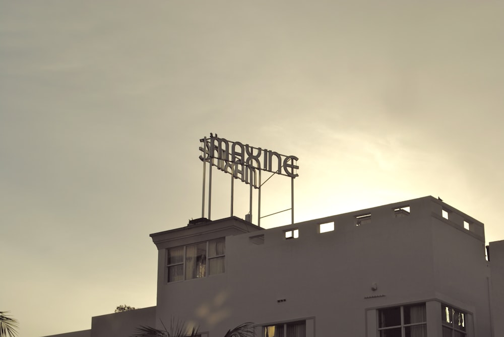 white concrete building under cloudy sky during daytime