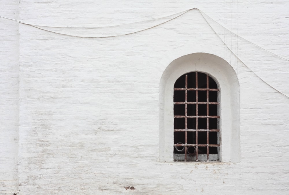 closeup photo of metal window