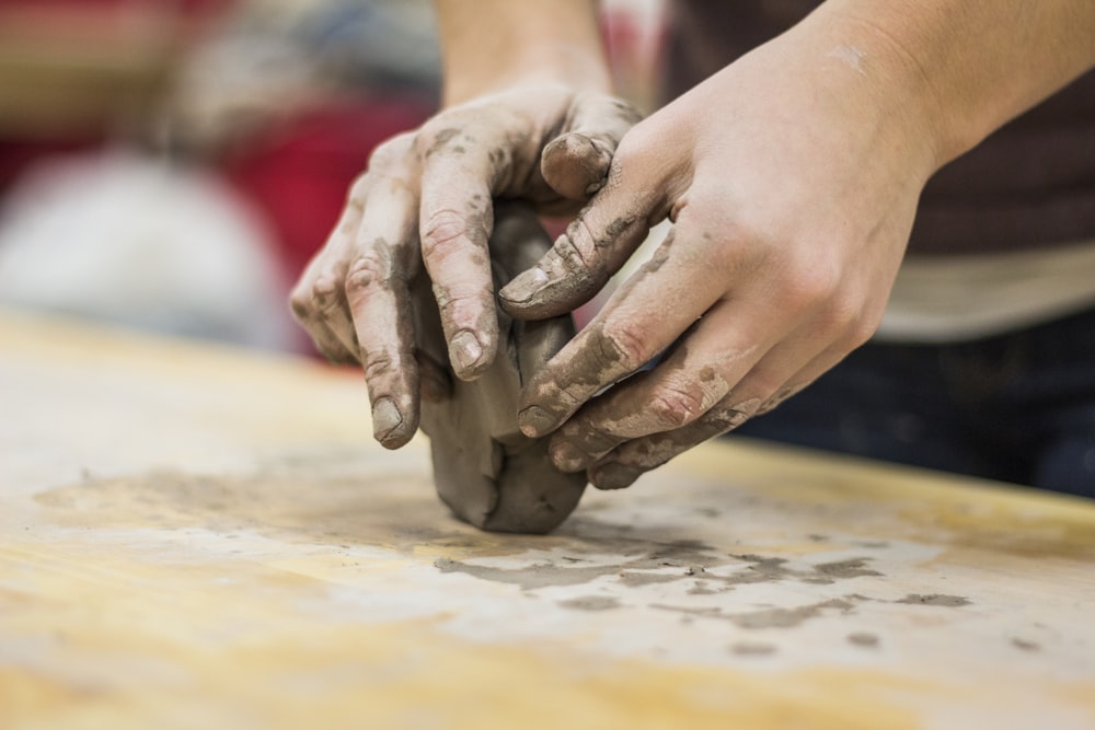 Person molding clay pot photo – Free India Image on Unsplash