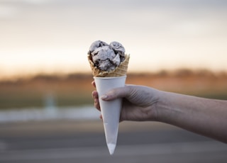 person holding ice cream