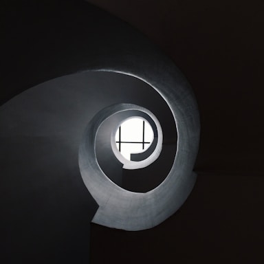golden ratio for photo composition,how to photograph dark spiral well; bottom view of concrete spiral stair