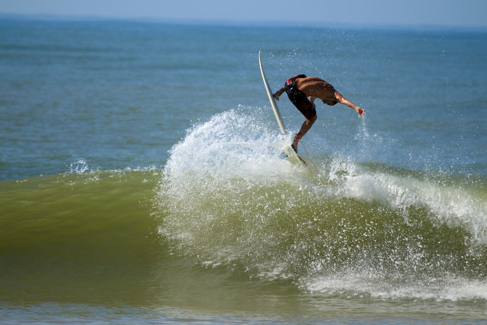 man surfboarding