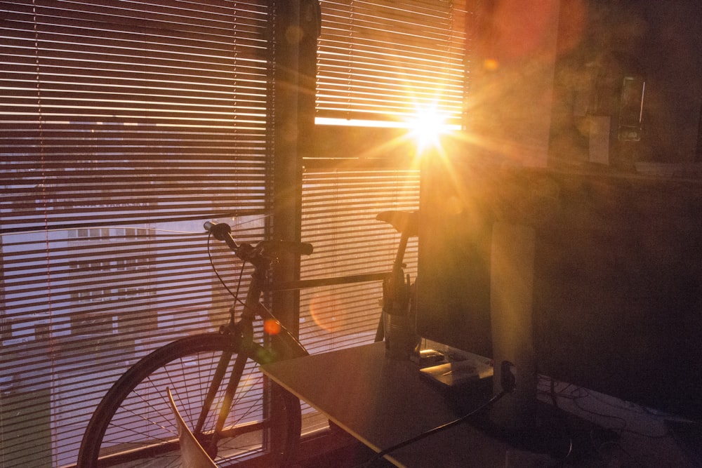 black bicycle on black table