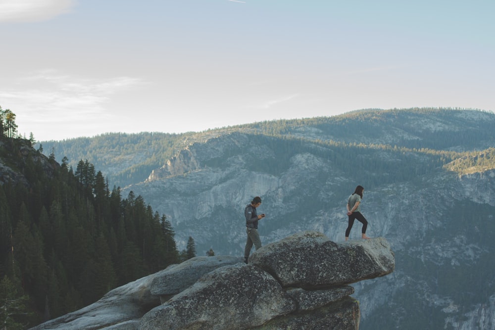 two men on mountain edge