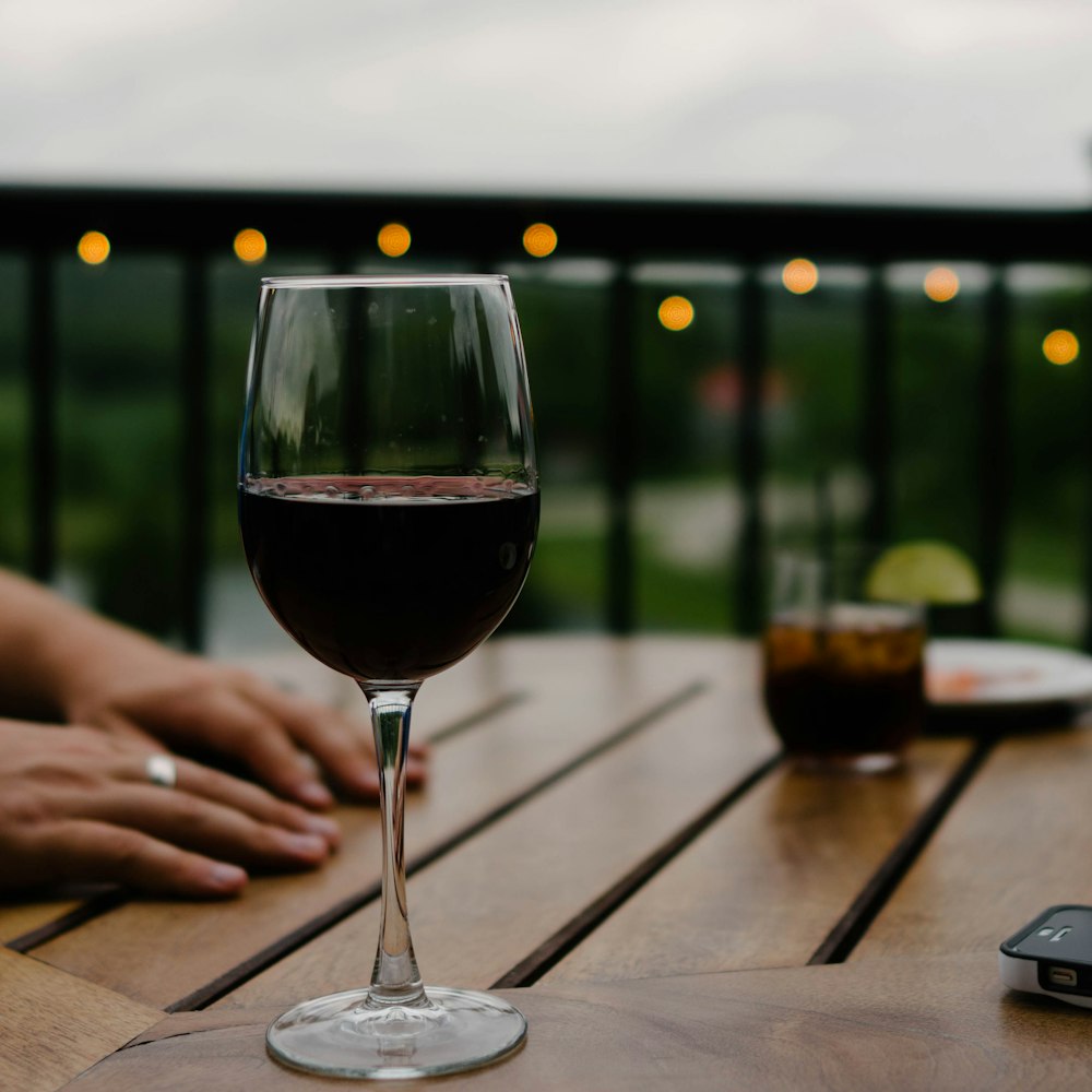 person hand on top of a table