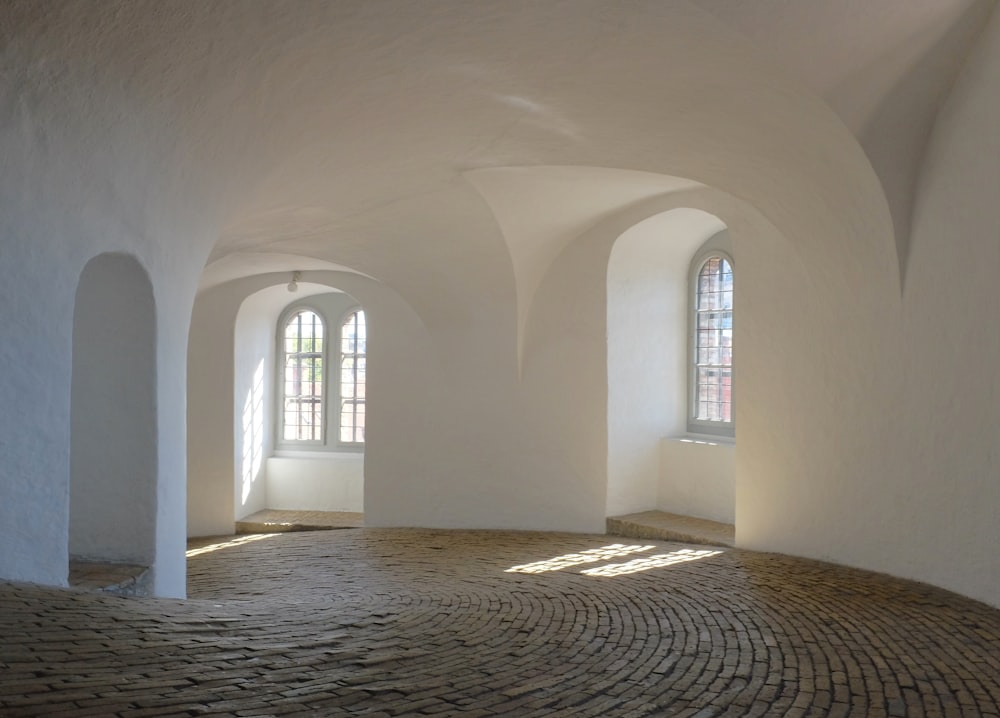 brown brick floor and white wall paint