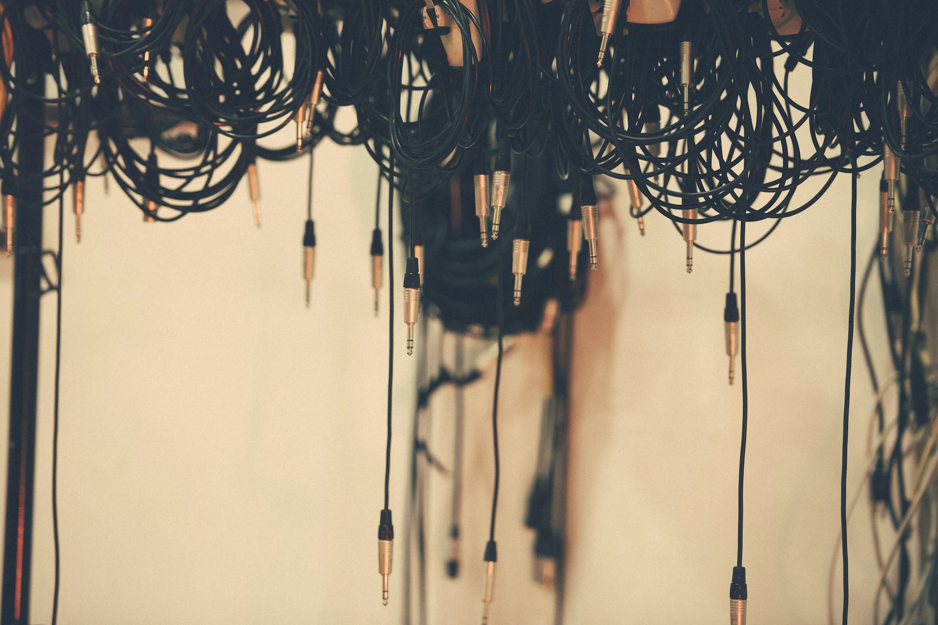 A dynamic display of different cable types laid out on a wooden table, highlighting texture and quality.