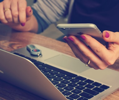 woman holding silver iPhone 6