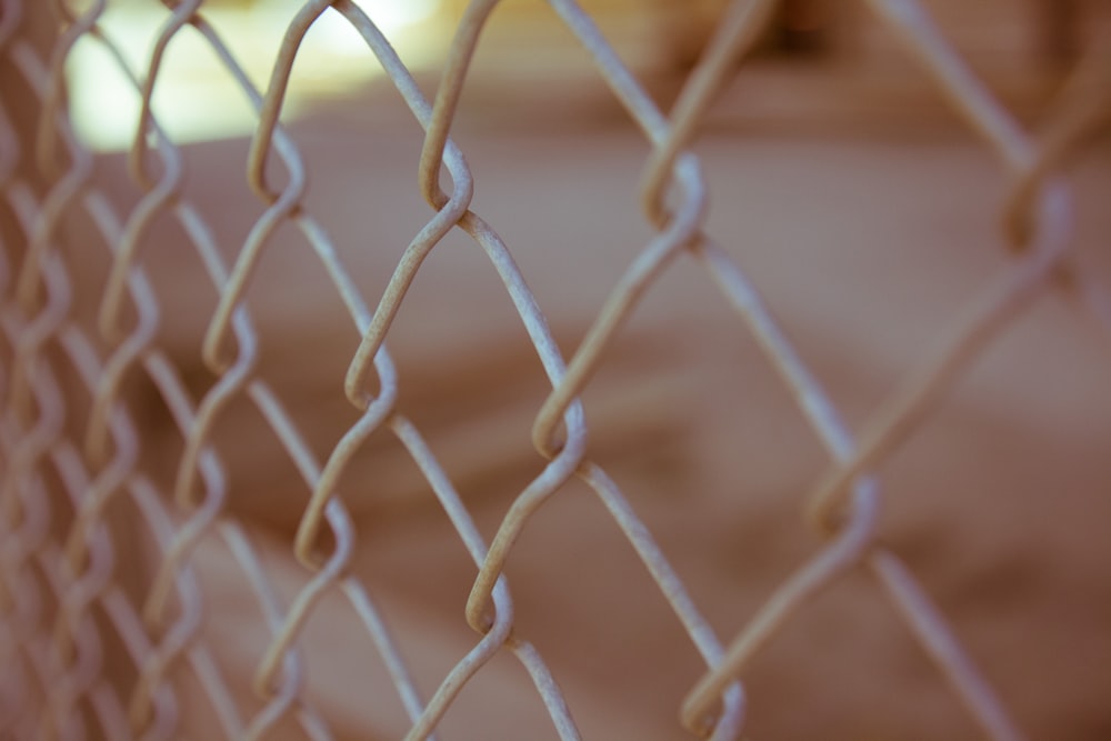 white steel cyclone fence