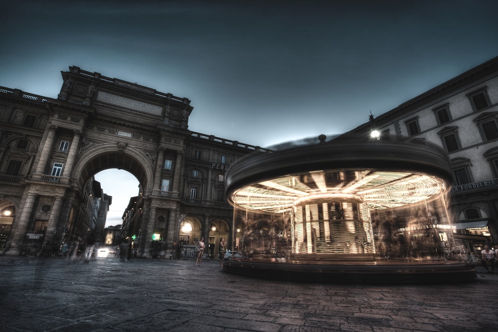 horse carousel with lights turned on