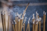 brown wooden sticks with white smoke