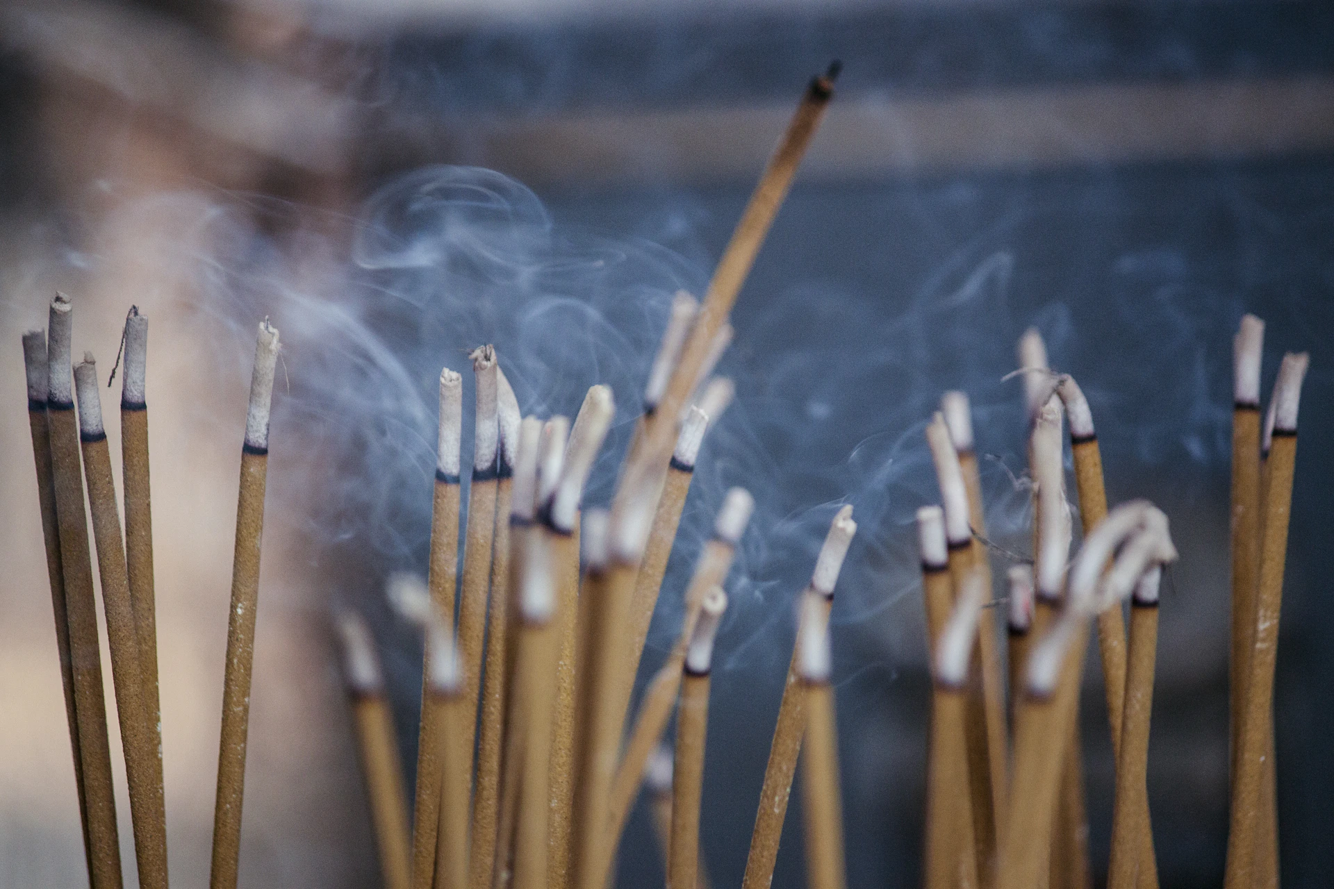 brown wooden sticks with white smoke