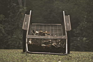 A sturdy garden tool cart in use during gardening.