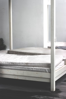 white wooden bed frame