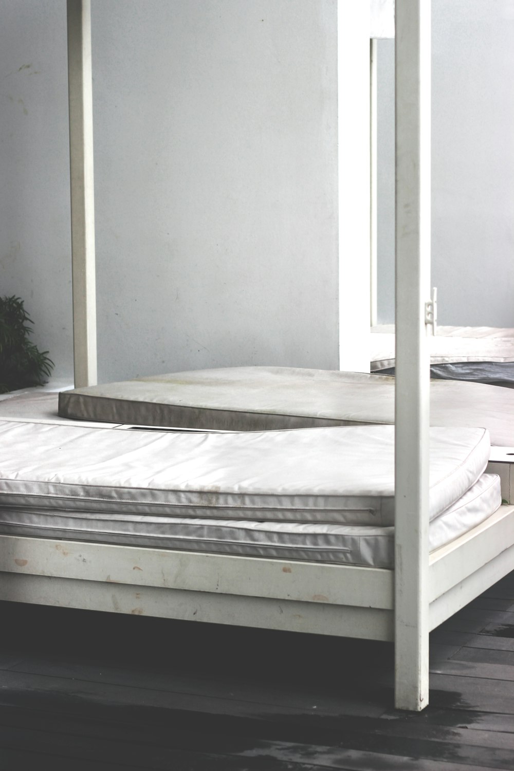 white wooden bed frame