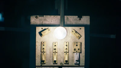 A glowing light switch being flipped on, representing the start of transformation.