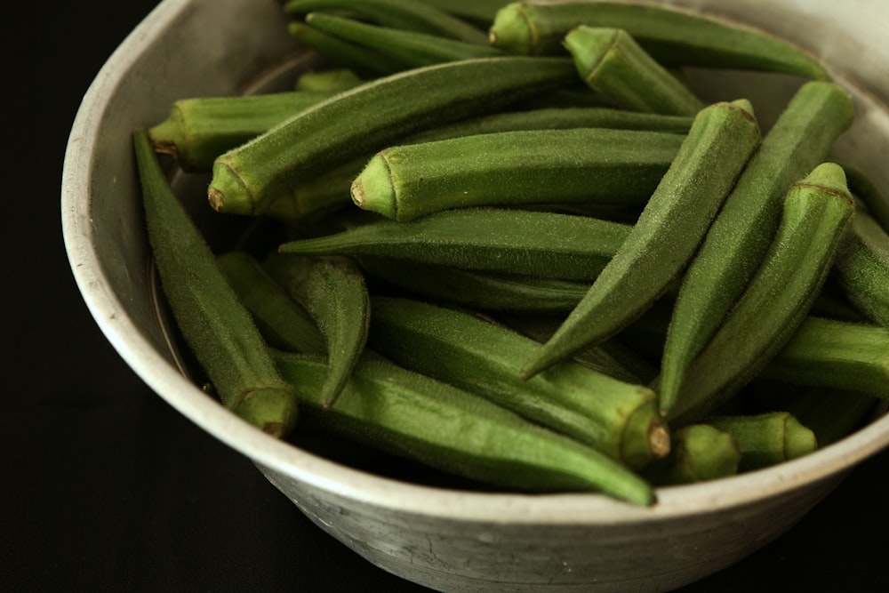 Okra vegetable in white bowl