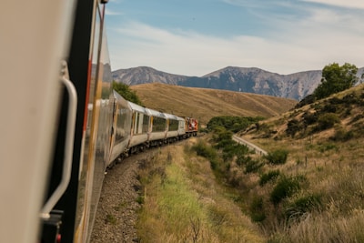 A train passing through a picturesque landscape.