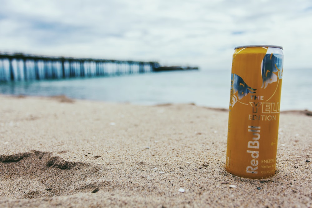 shallow focus photo of orange can