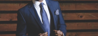 man wearing blue suit