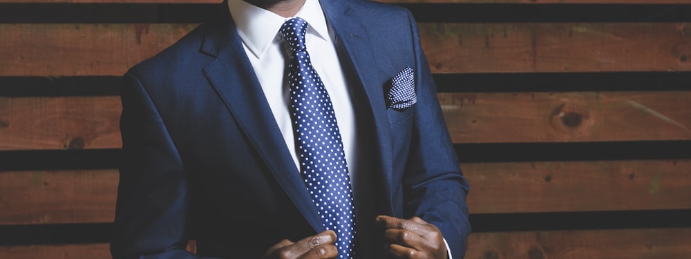 man wearing blue suit