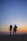 man and woman holding hands in silhouette photography