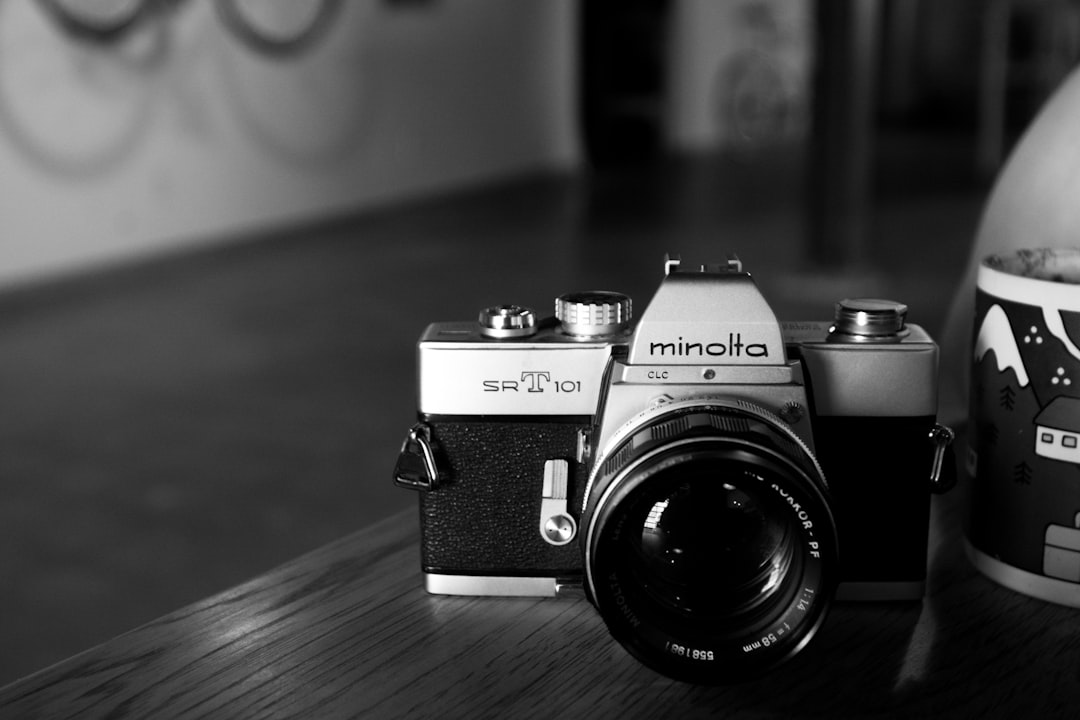 Minolta SLR camera on table