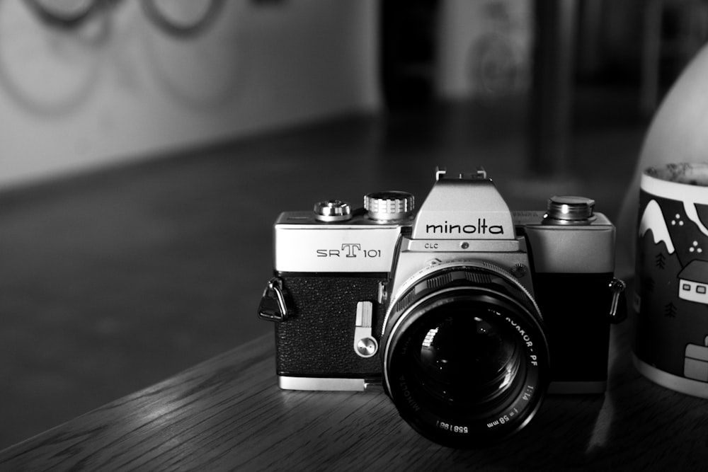 Minolta SLR camera on table