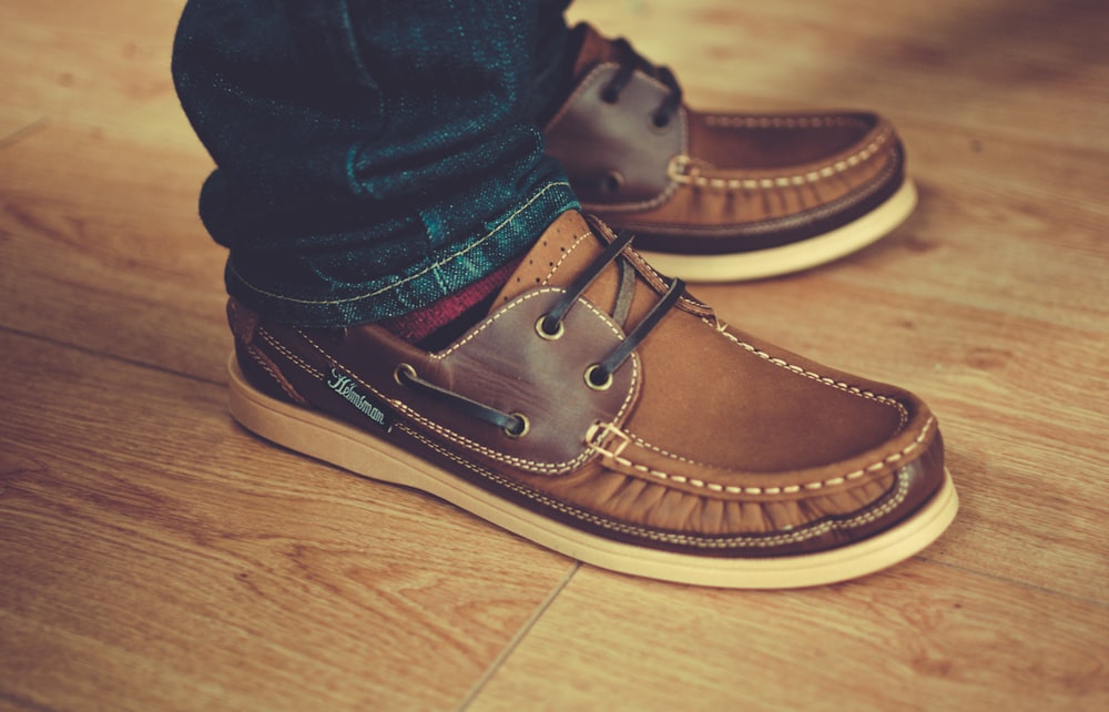 person wearing pair of brown leather shoes photo – Free Shoe Image on  Unsplash