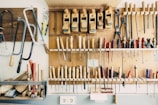 assorted handheld tools in tool rack