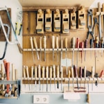 assorted handheld tools in tool rack