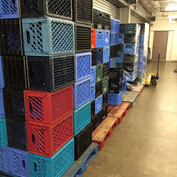 Close-up of durable, brightly colored material handling pallets ready for transport.