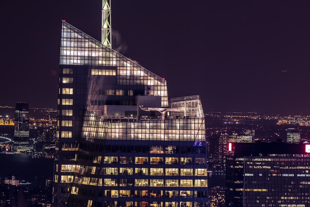 high-rise buildings with lights on during nighttime