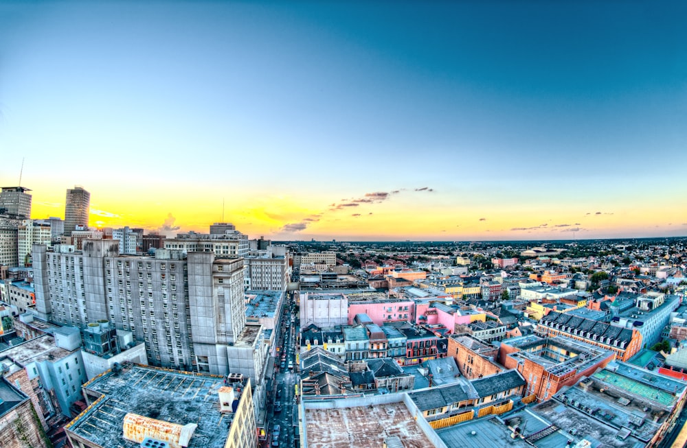 aerial photography of city buildings during yellow sunset