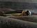 Close-up of a luxury engraved pen with a sleek black and gold design.