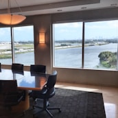 Elegant conference room with city skyline view.