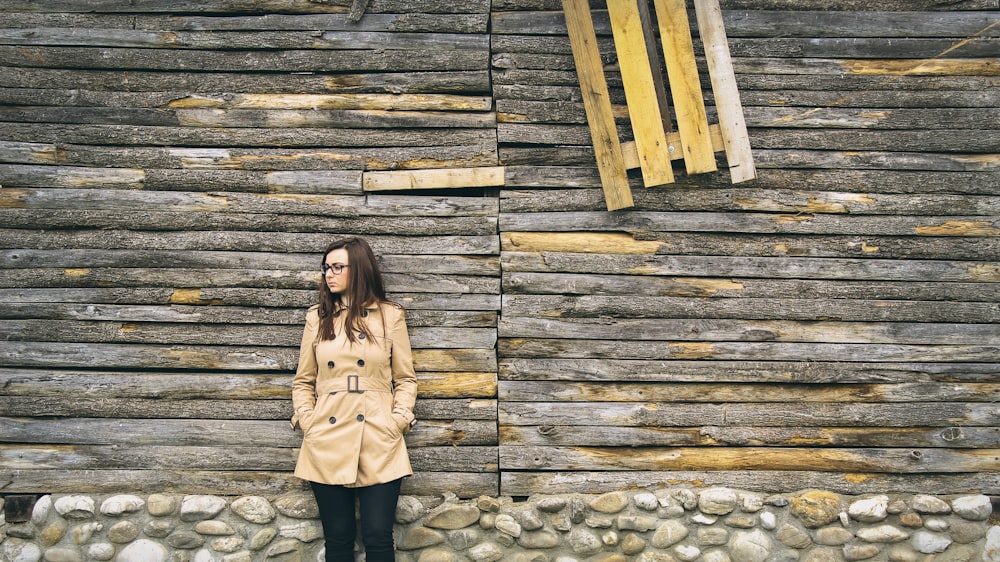 woman leaning on wall