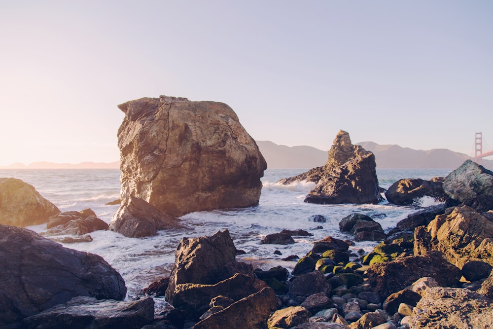 rock formation on body of water