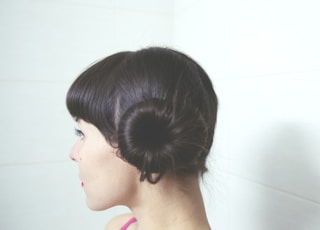 woman with straight black hair bun